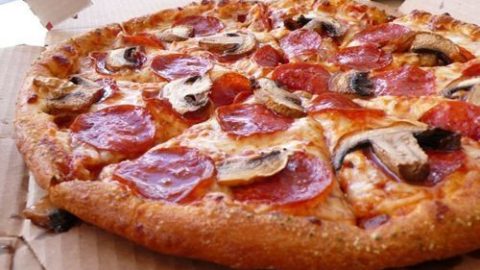 Domino’s slices 49% off pizza prices